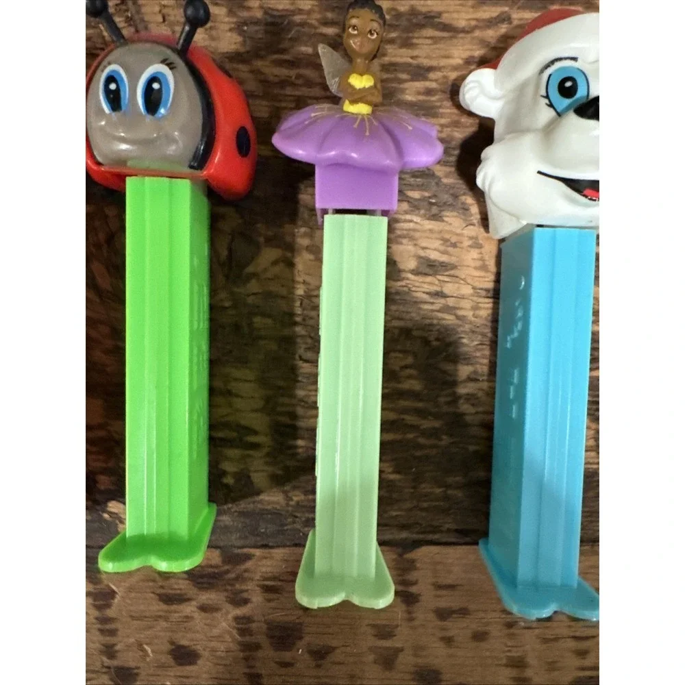 6 VINTAGE PEZ DISPENSERS Hello kitty, Homer Simpson, Santa, Etc
